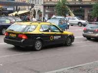 Švédský taxík. Uniformní, luxusní, rychlý a drahý.